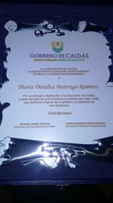 mejor rectora, Mar�a Doralice Buitrago, de la Instituci�n Educativa Encimadas en Saman�